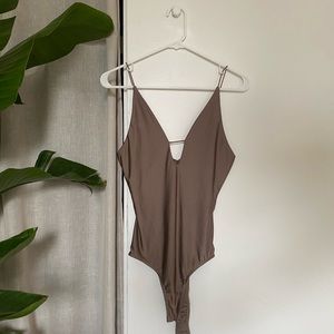 Tan chrome body suit
